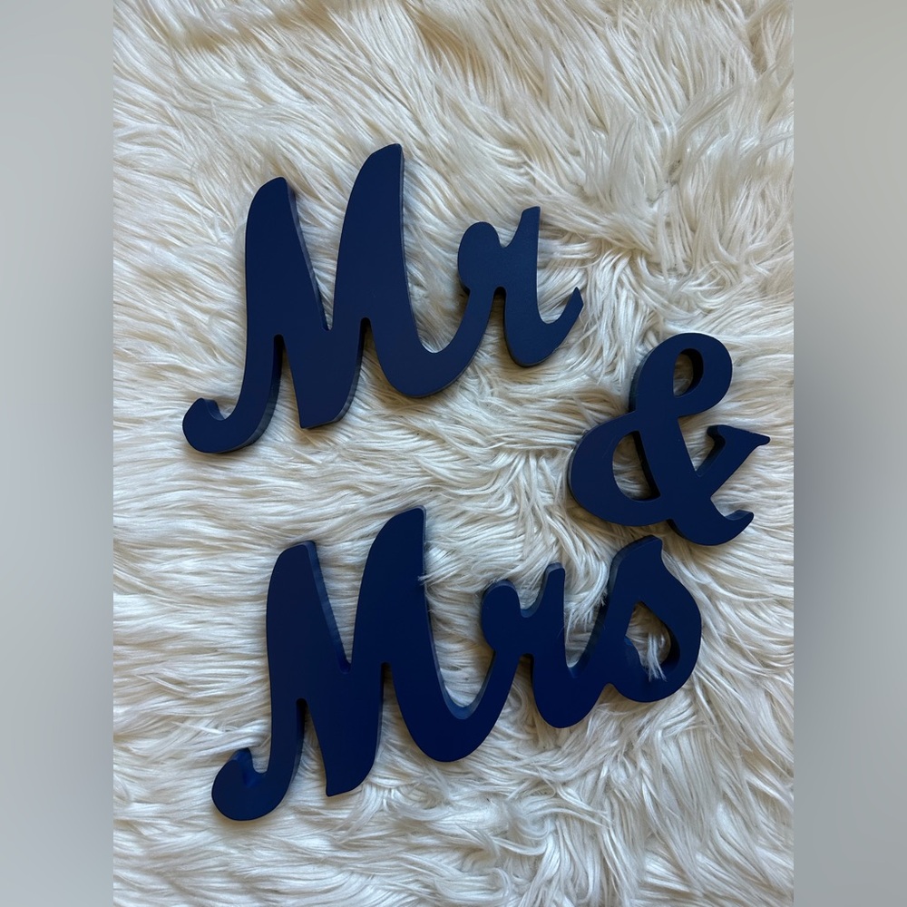 “Mr. & Mrs.” wooden prop sign